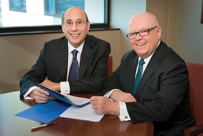 Two men sitting at a table
