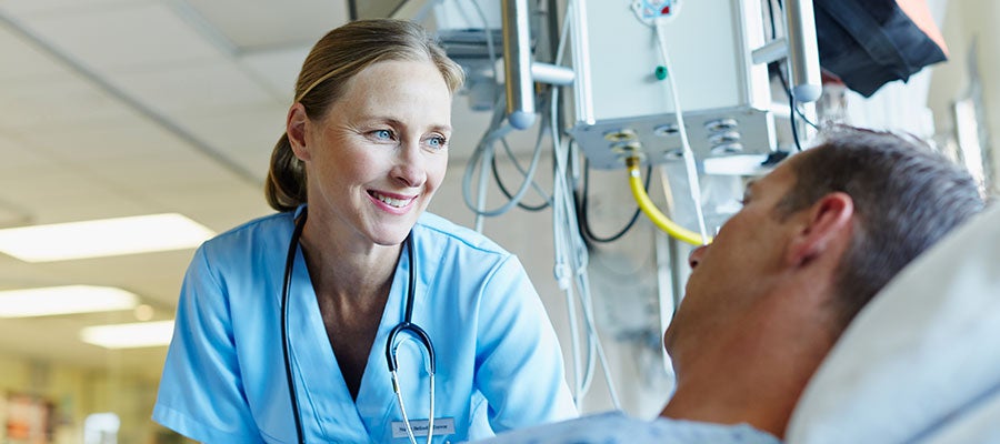 nurse caring for man