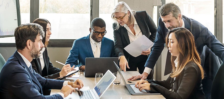 Group of business people actively participating in a meeting